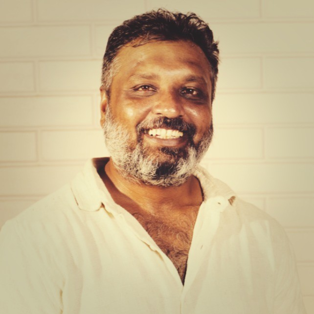 Portrait of Madhu Chandan S C, Founder and CEO of Organic Mandya